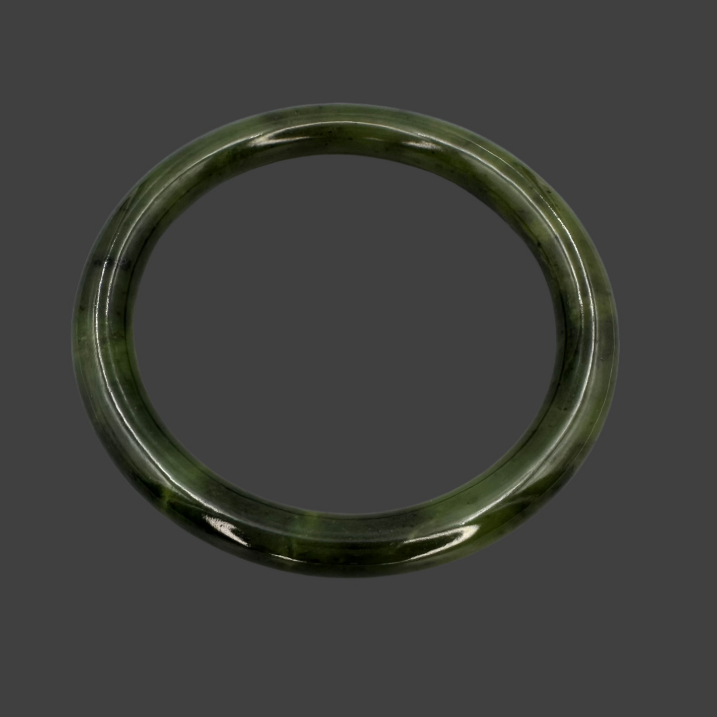 Pair of solid dark green Jade bangle bracelets