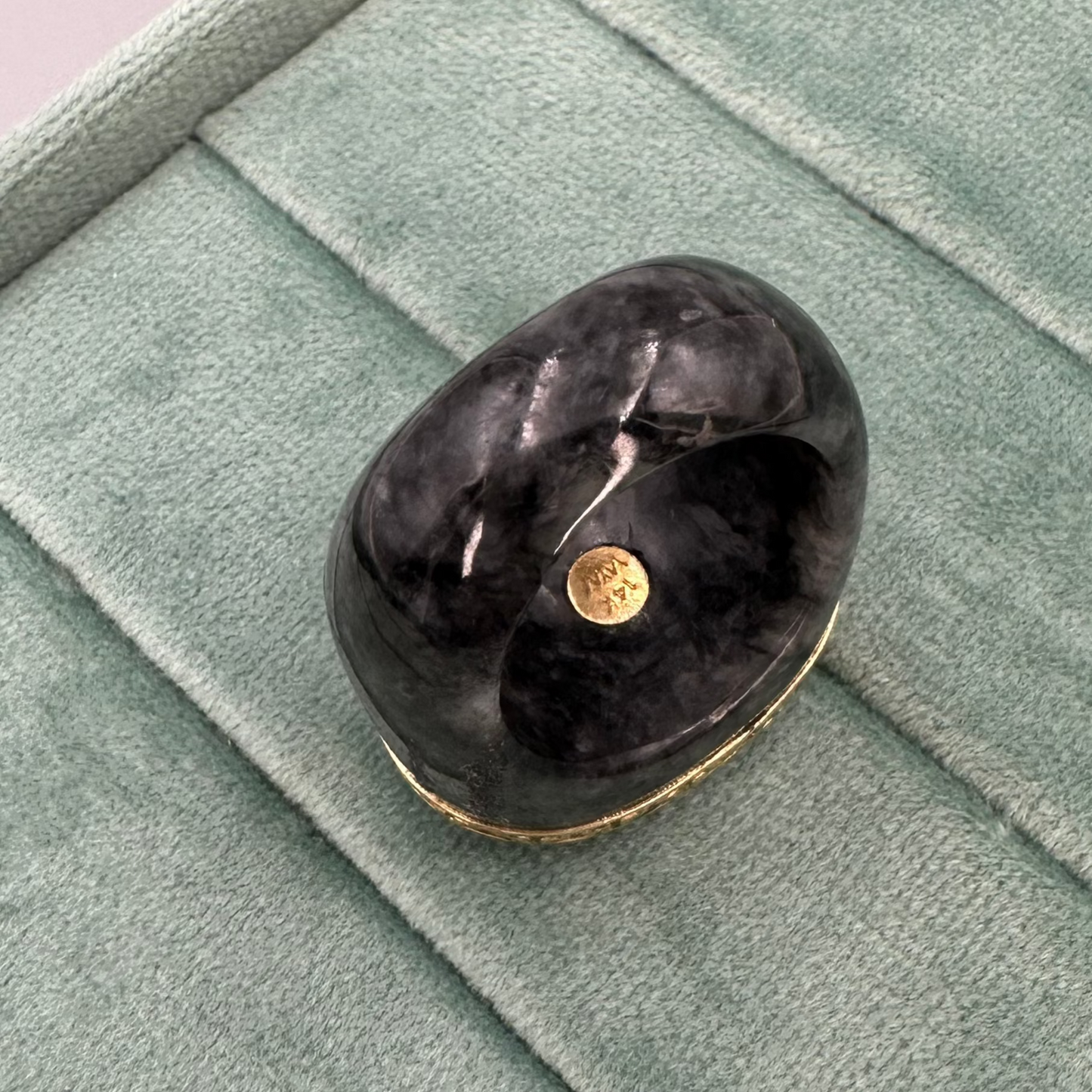 Large opal with black Jade ring