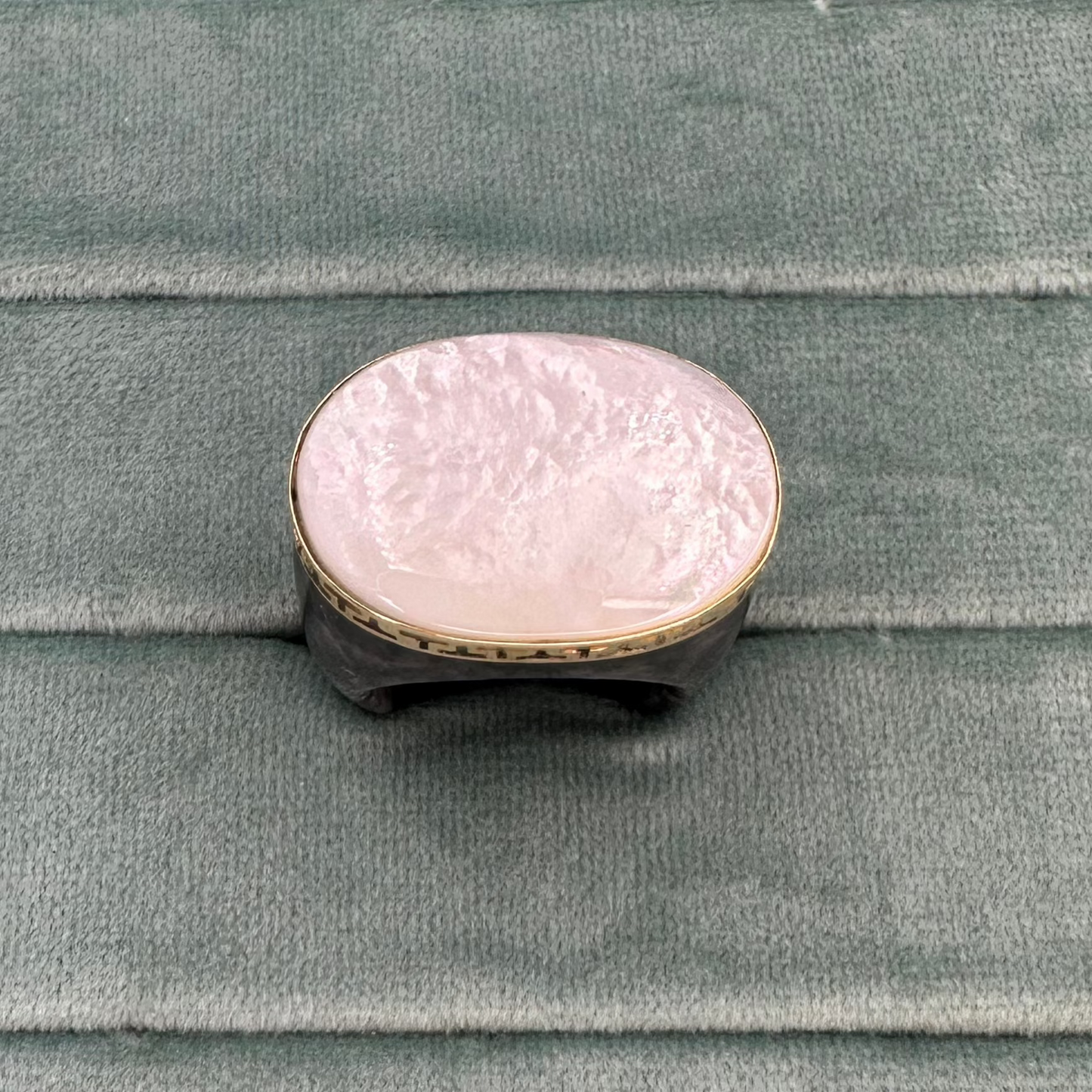 Large opal with black Jade ring