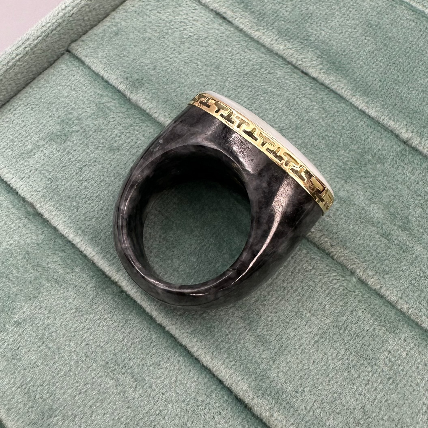 Large opal with black Jade ring